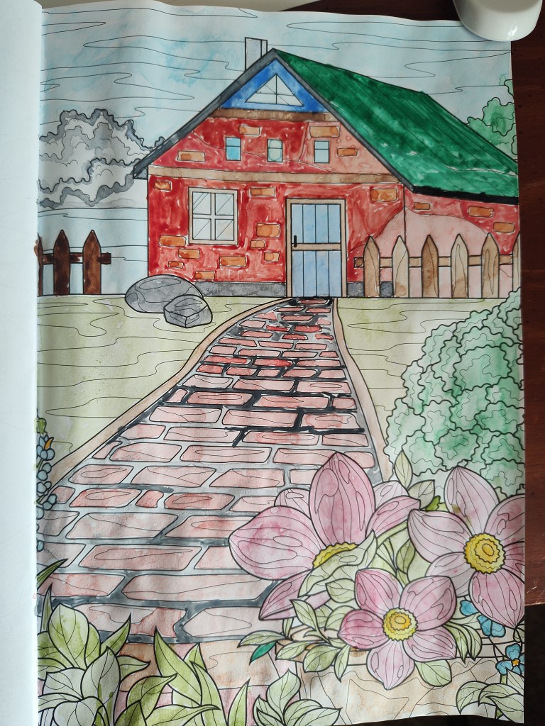 Watercolor image of a red house on the countryside